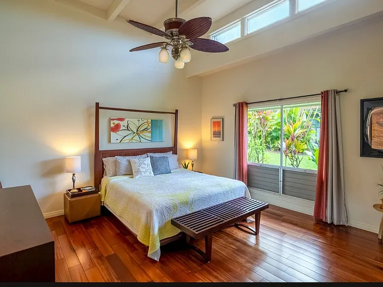 Enjoy a king, ensuite Main bedroom. This very spacious bedroom is one of the largest bedrooms in all of Princeville.
Complete with plenty of windows and an off room private lanai.
You will also enjoy walkin closet.