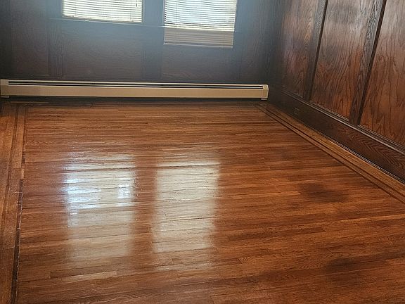 All original hardwoods throughout the apartment, on the walls as well.