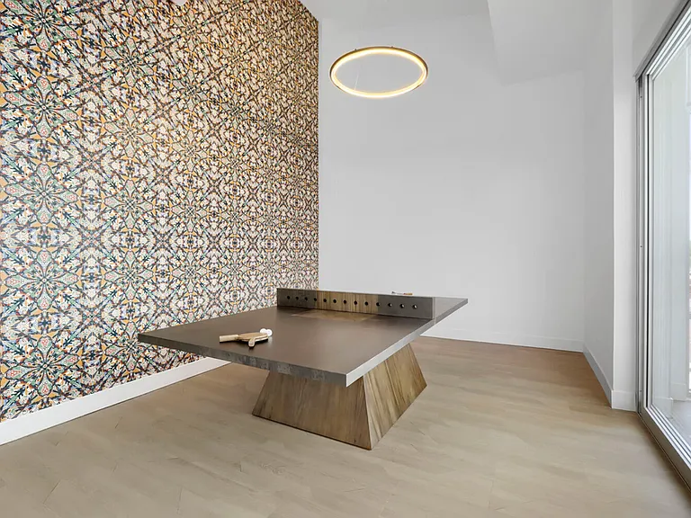 Garrett Uptown is serving it up with the 2-story clubhouse, including a designer ping pong table set against a dramatic hand-laid tile wall _ because even your rec room should have good taste.