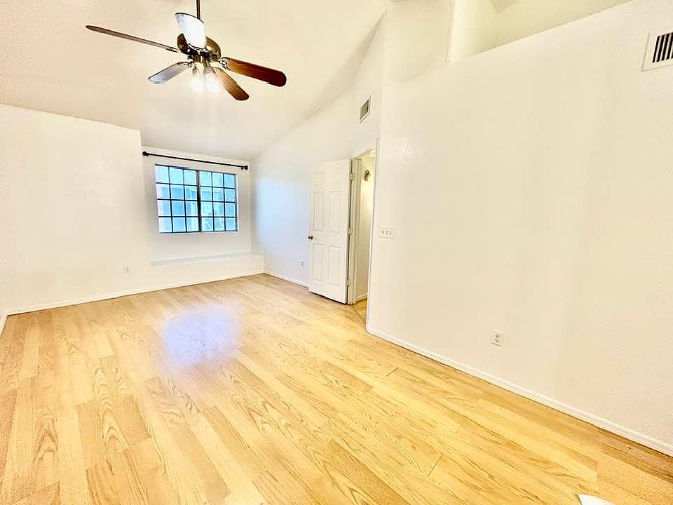 Master bedroom, vaulted ceiling, ceiling fan, spacious, with large walk in closet, private bathroom, vanity area.