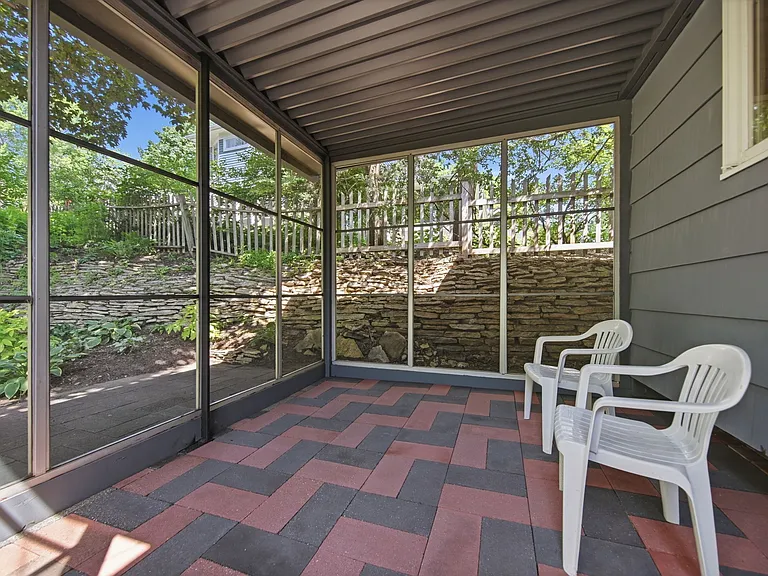 Private screened-in porch with electrical outlet