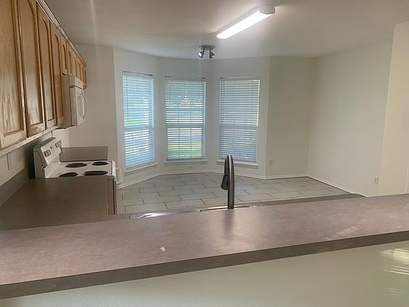 Open floor plan from the kitchen into the living area.