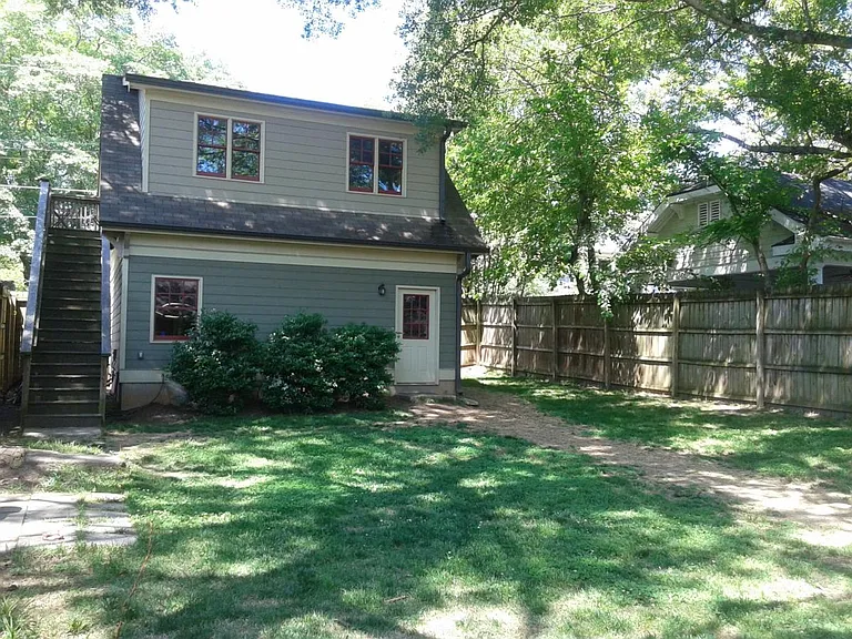 Backyard With Carriage House