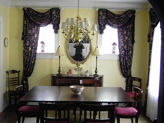 Beautiful Arch Separates Formal Living and Dining.