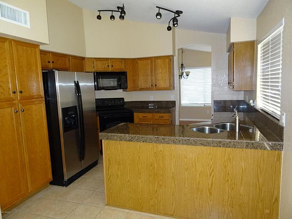 5th image of 11026 W Poinsettia Dr