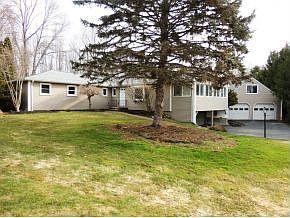 Spacious Ranch sited on .93 ac