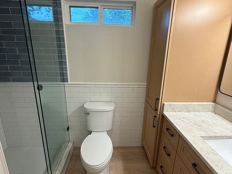 Beautiful bathroom with tile, quartz and new cabinetry