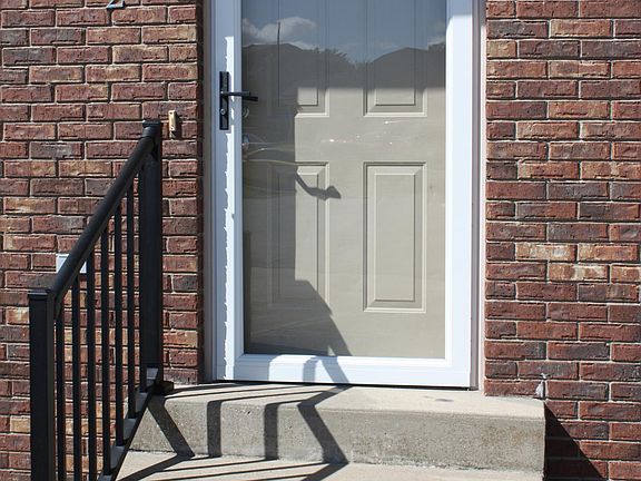 Front Door and lAnderson locking screen door