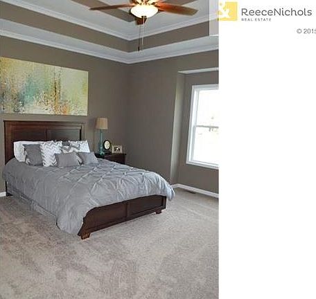 Master bedroom with a wonderful view of the pond