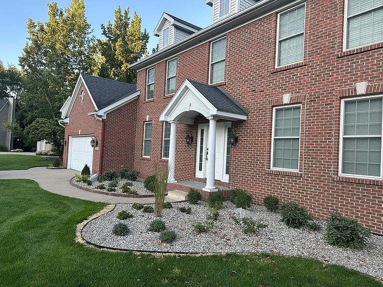 View of the front yard with brand new landscaping - Fall 2025