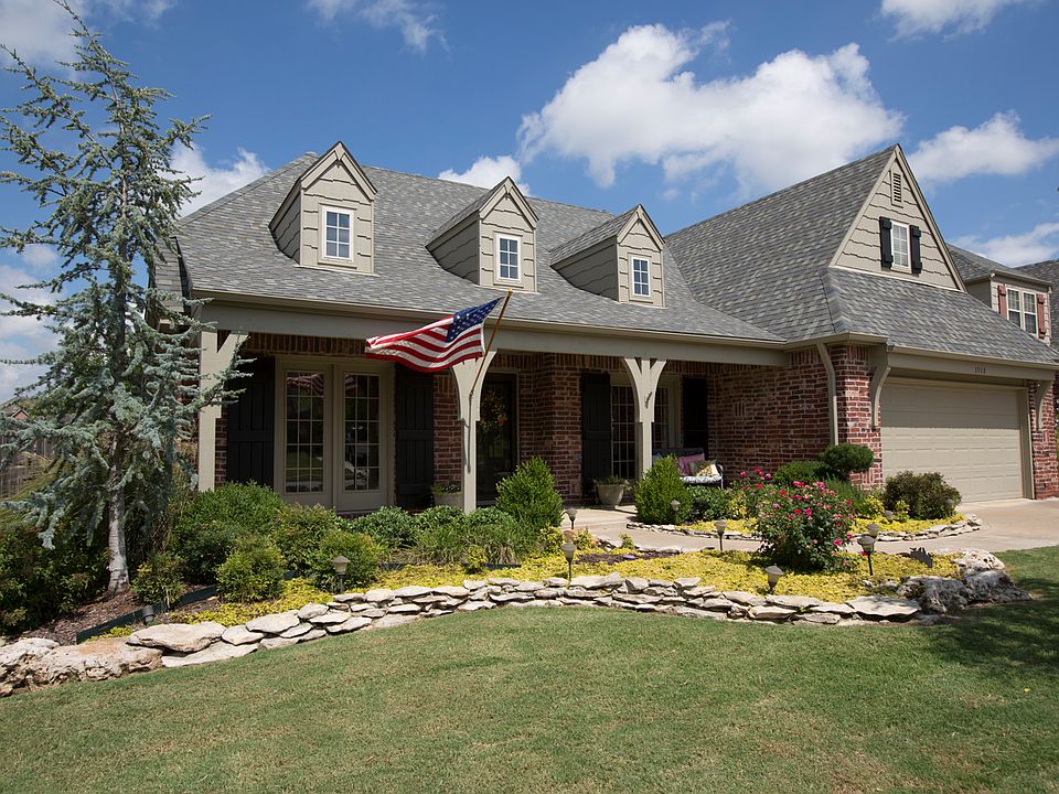 Gorgeous home on corner lot in desirable Villages of Birchwood features professional landscaping, veranda style porch and 3 car tandem garage with inground storm shelter.