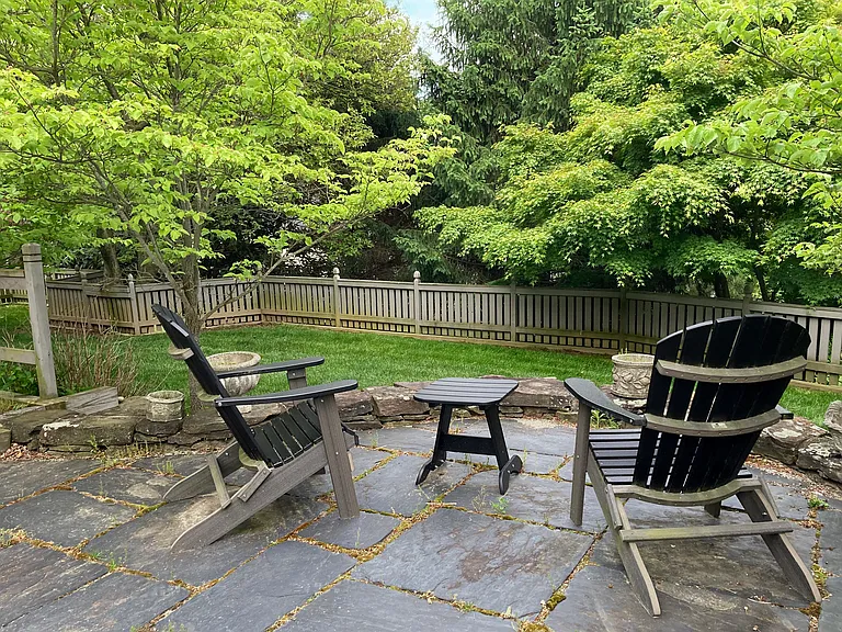 outdoor seating overlooking the backyard (furniture included)