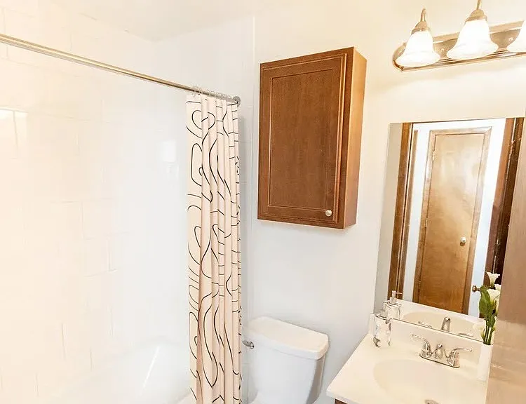 Transform your daily routine in the sleek bathroom of Central Lakes of Uptown. Enjoy modern amenities and a bright, inviting atmosphere that enhances your living experience. Schedule a visit today to see it for yourself!
