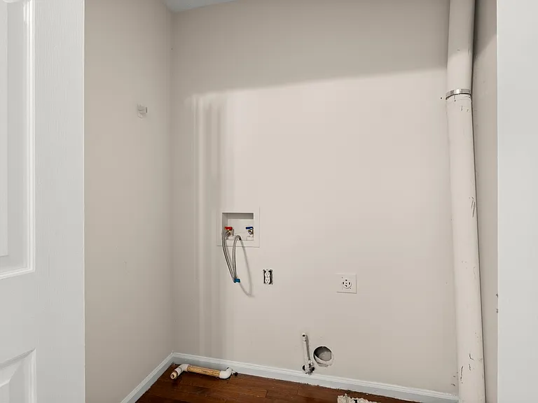 Washer and dryer room.