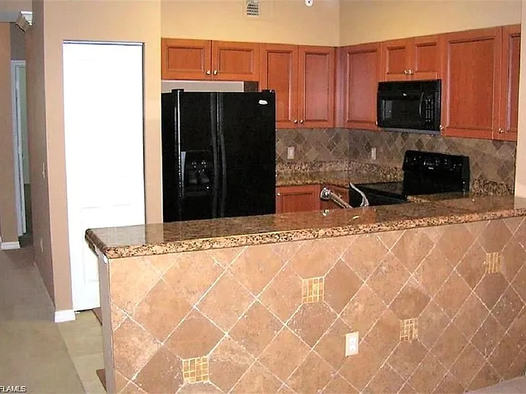 10101 Villagio Palms Way #206 — Photo 5