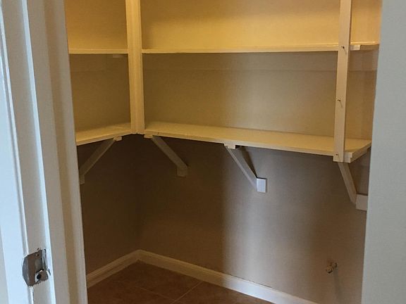 Oversize pantry with built in custom shelving