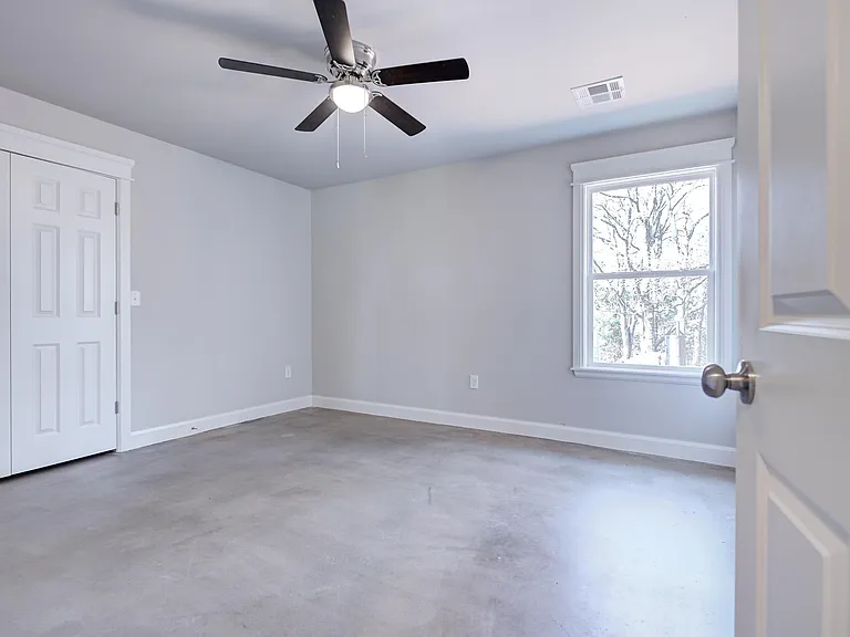 Bedroom number 2 with walk in closet with built in dresser
