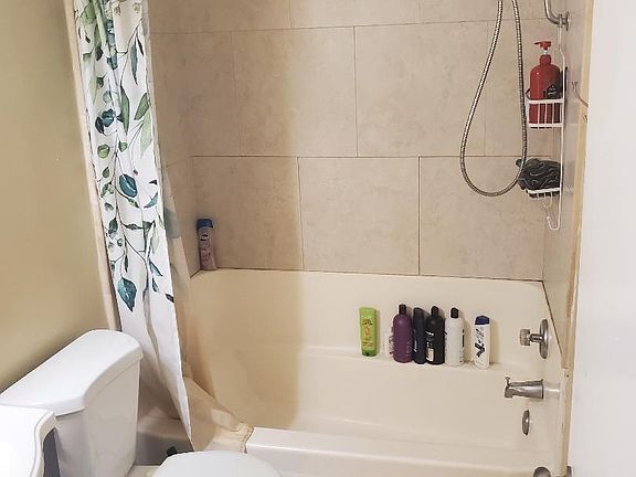 Upstairs bathroom with bathtub/shower