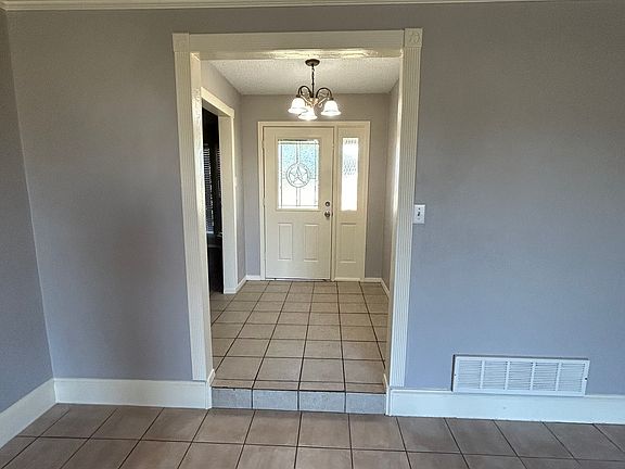 Step down from foyer into the family room