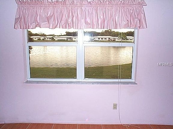 4th image of 9827 Mainlands Blvd E