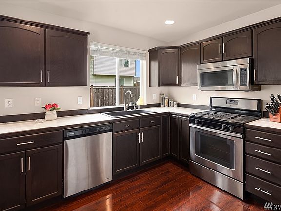 Updated Kitchen with Stainless Steel Appliances, Gas Range and Composite Sink with Insta-hot.
