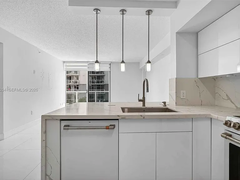 5077 NW 7th St — Photo 12
