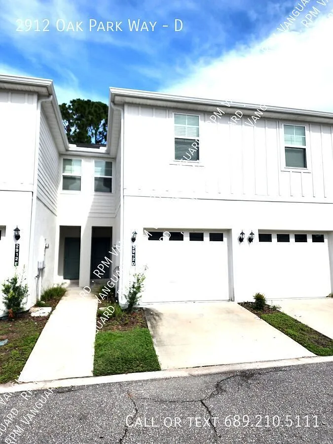 Two-Story Townhouse with Garage, Screened-in Patio and In-Unit Laundry — Photo 1