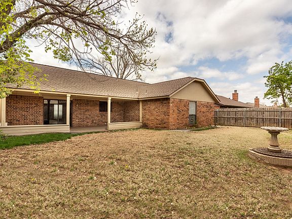 Great backyard with covered patio. Perfect for family BBQs or just chilling outside.