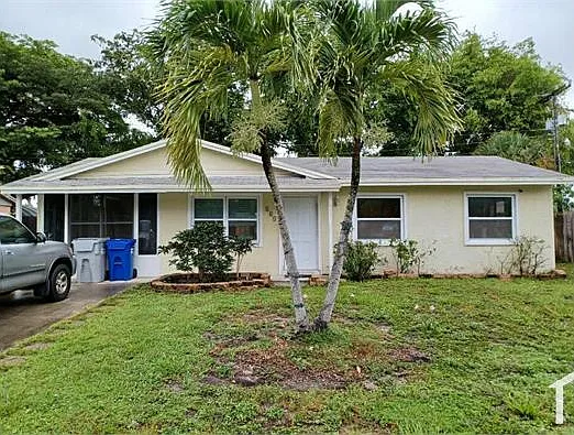 561 NW 21st Ct — Photo 1