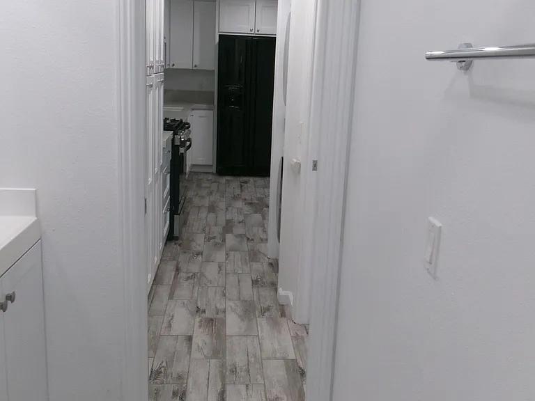 From bathroom, looking toward kitchen