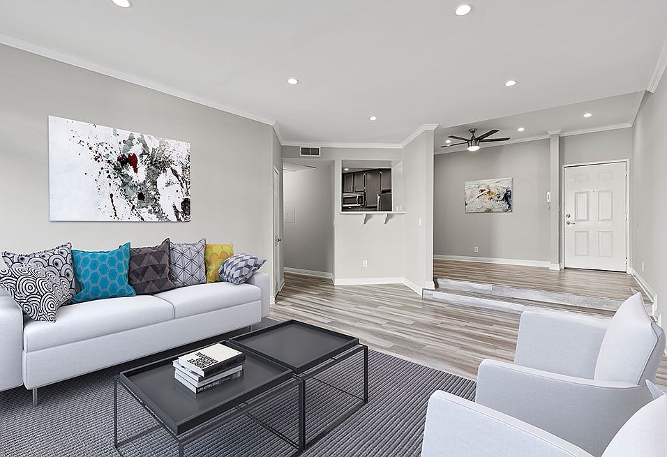 Large living room featuring hardwood floors.