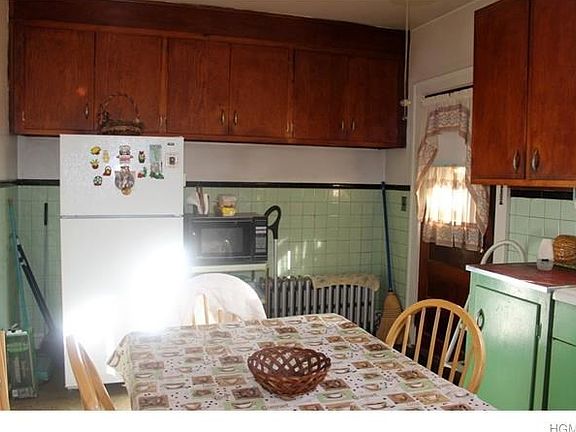Apartment 1  Kitchen with door to yard.