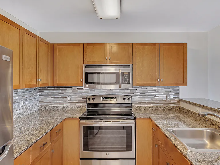 Large kitchen with ample cabinet and counter space