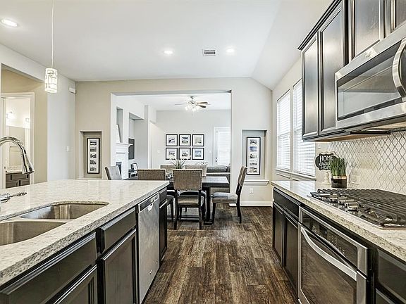 Notice the double sink! You can get a better look at the backsplash from this angle.