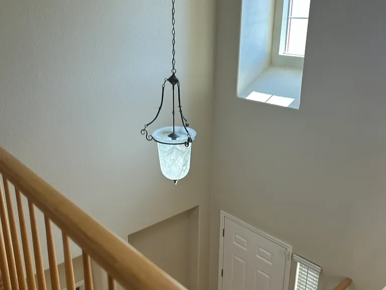View from upstairs hallway, vaulted ceilings, freshly painted interiors