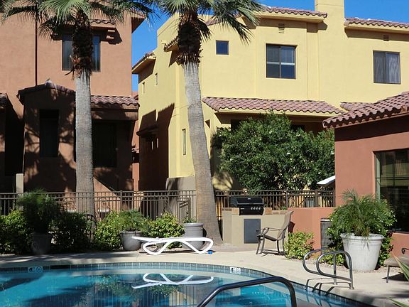 View of home from pool and clubhouse area