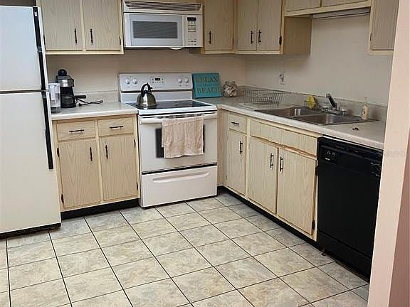 4th image of 970 85th Ave N APT 209