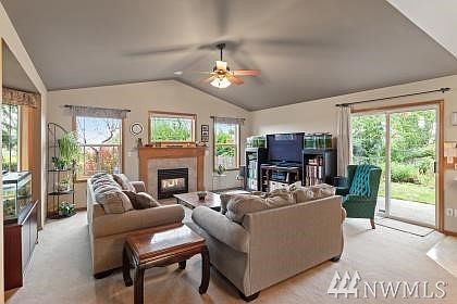 Kitchen with eating space opens to dining area & living room