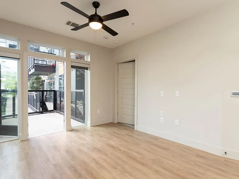 Living Room with Patio and Hard Surface Flooring