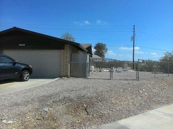 Boat and RV parking on side of house