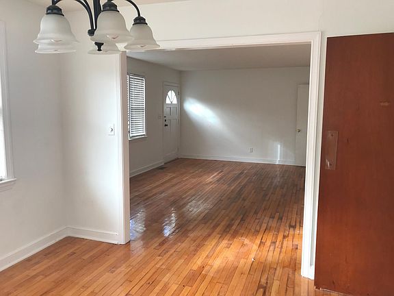 View from dining room. Kitchen through door to right.