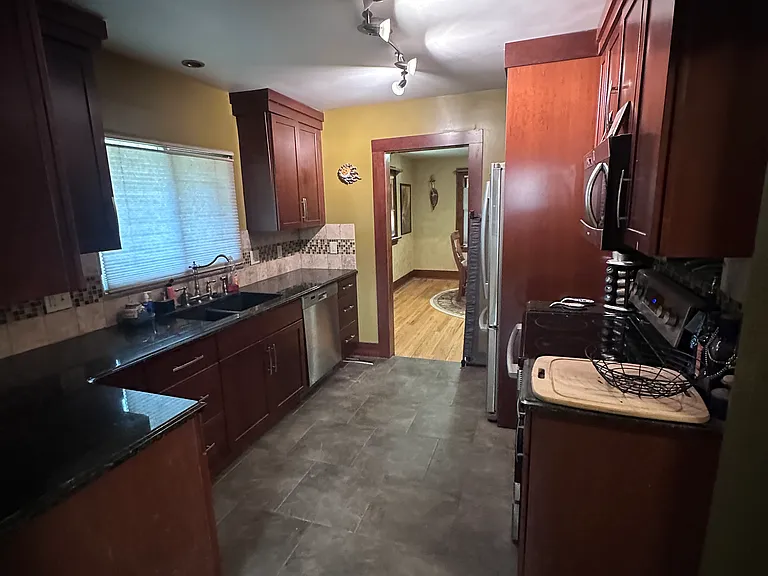 210 N Shields St — Photo 8
