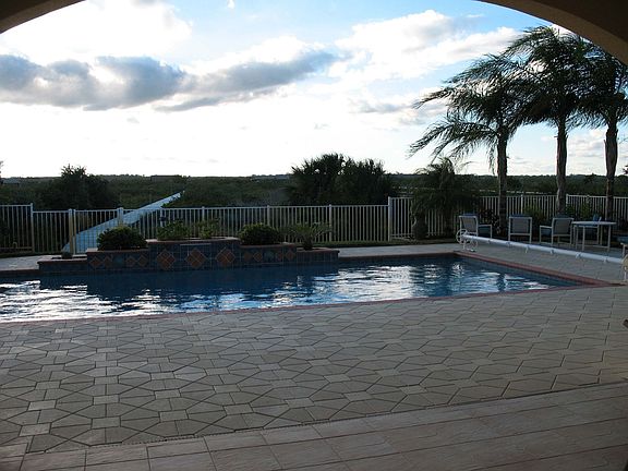 large heated pool with diving board, waterview