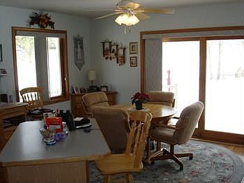 Partial kitchen and dining area