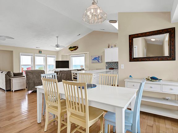 Open floor plan-great for entertaining and family gatherings. Dining table seats 6 comfortably and there are 4 additional bar stools at the counter.
