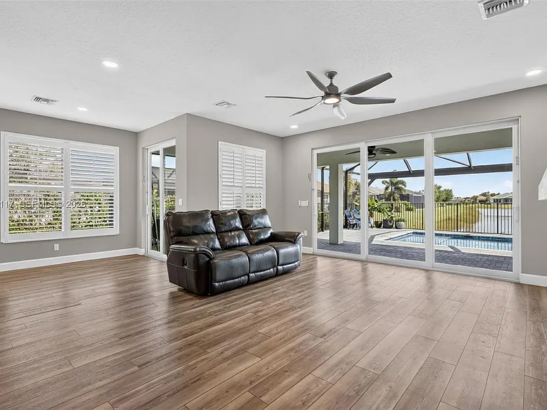 11996 SW Seahorse Springs Ter — Photo 26