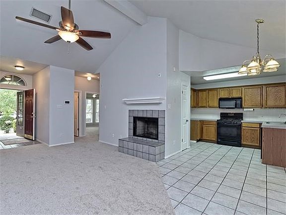 Bright and open floor-plan with vaulted celings