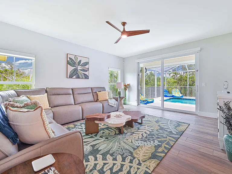 TV room looks onto the pool