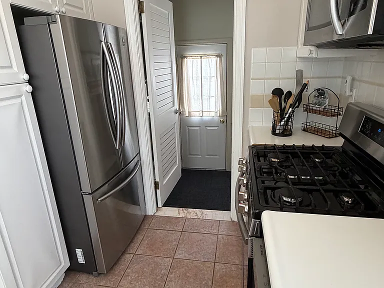 7703 Winchester Ave — Photo 8
