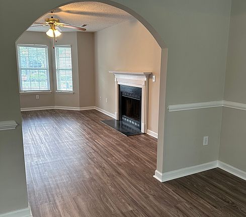 View of wood-burning fire place from dining room